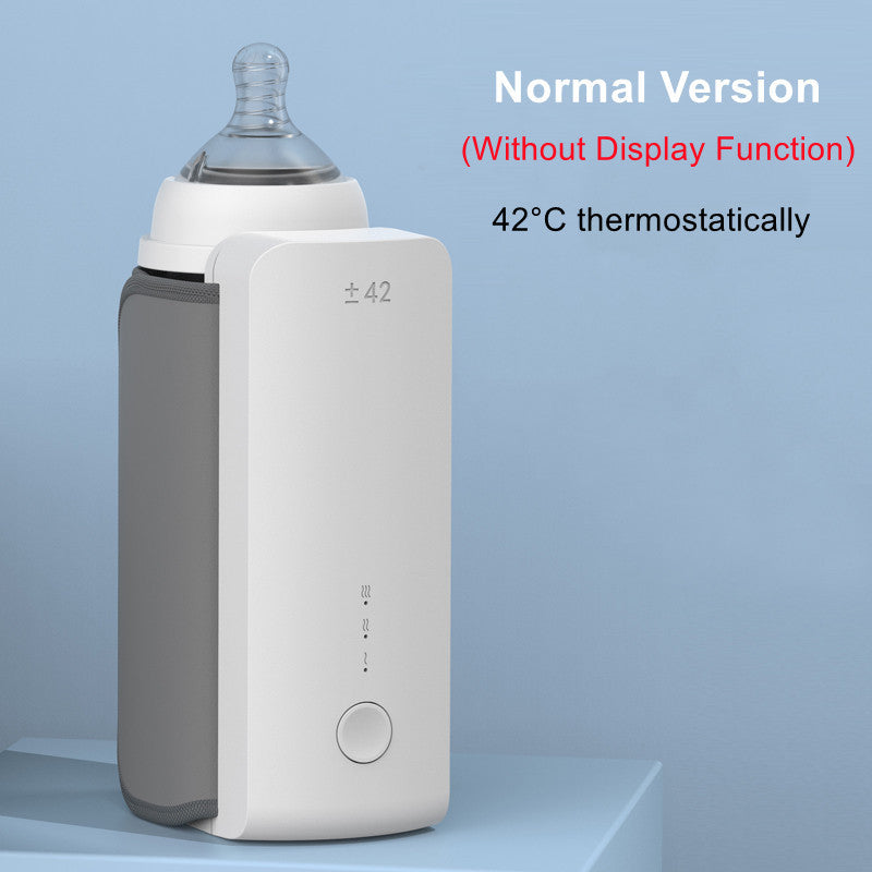 Calentador portátil de leche para el bebé. Carga USB, mantiene la temperatura constante de la leche o calienta el agua de la botella.